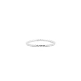 Thin silver ring on a white background, close up front view